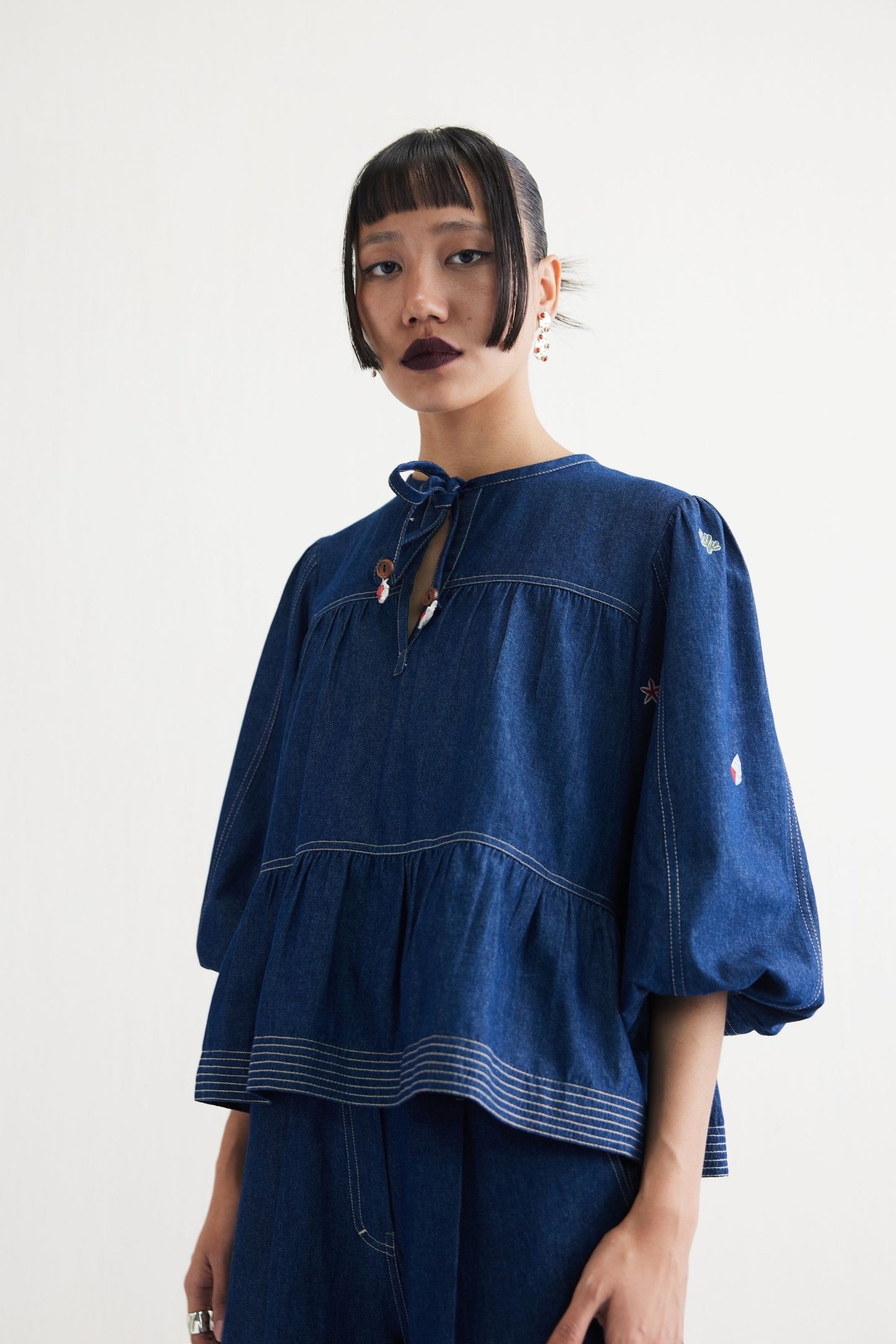 Deep Sea Sustainable Denim Peplum Top